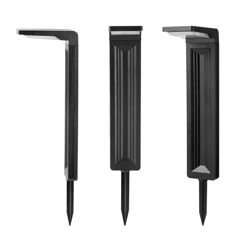 Drei schwarze LED-Solarlampen mit Erdspieß, von verschiedenen Seiten gezeigt